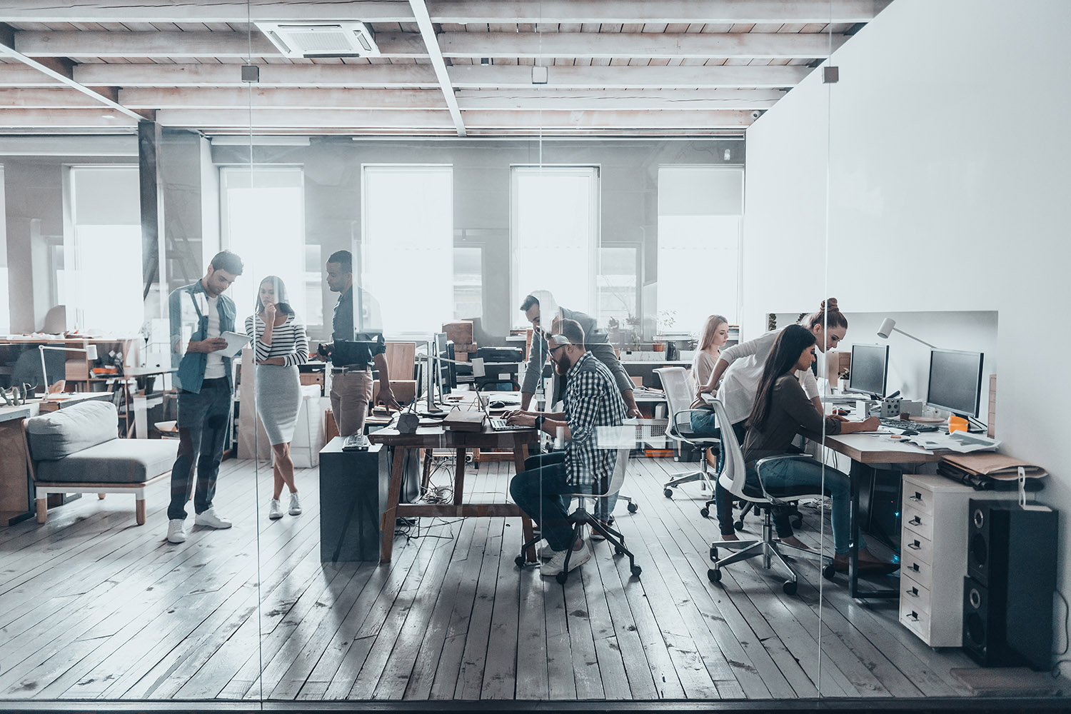 Group of team members working in office