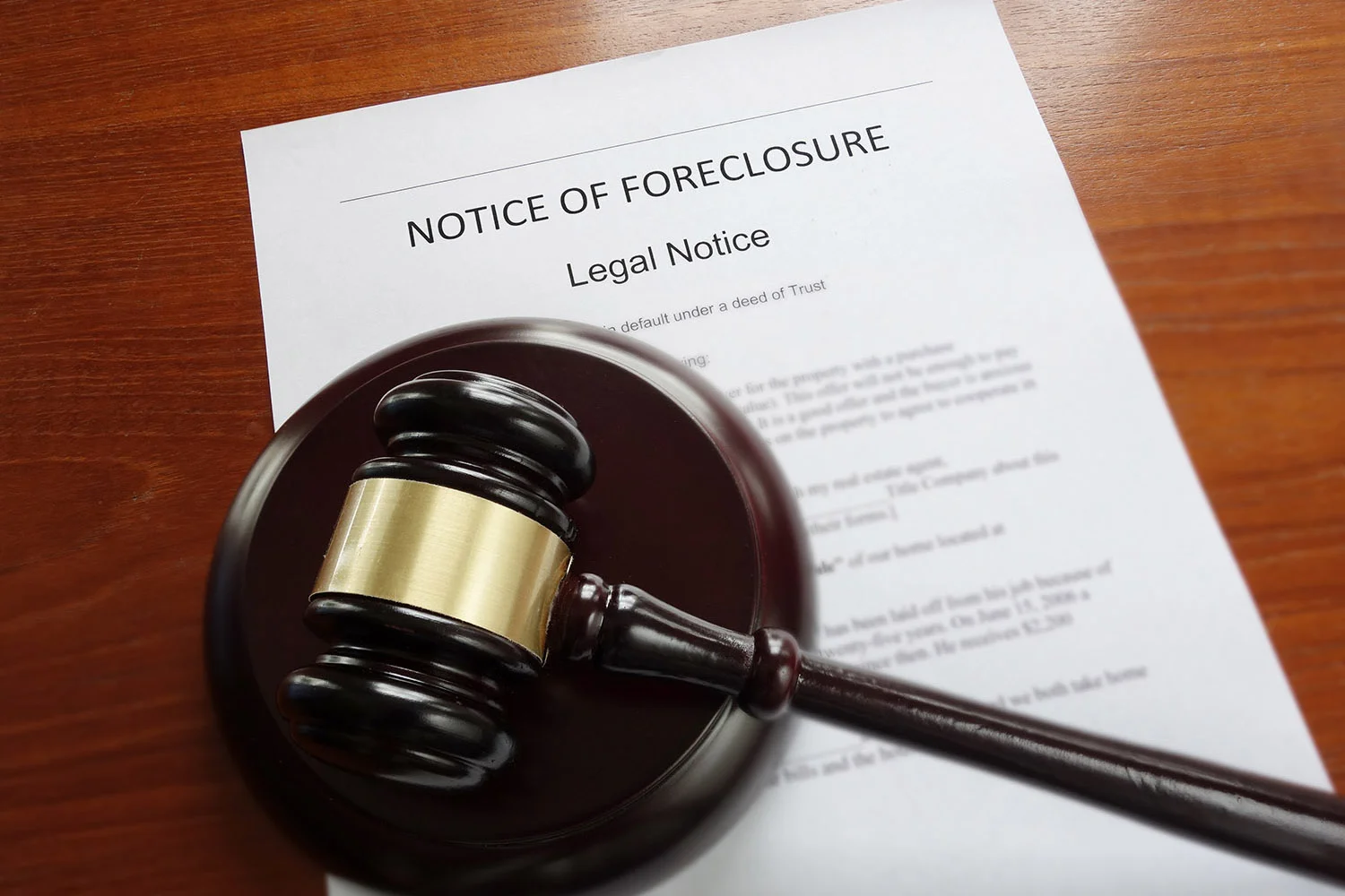Home foreclosure document with legal gavel
